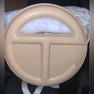 Telfar circle bag color cream
